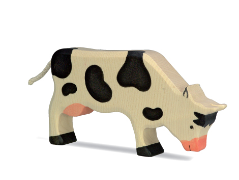 Holztiger - Kuh, schwarz grasend - zum Schließen ins Bild klicken